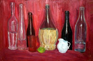 Fiaschetta e bottiglie su sfondo rosso